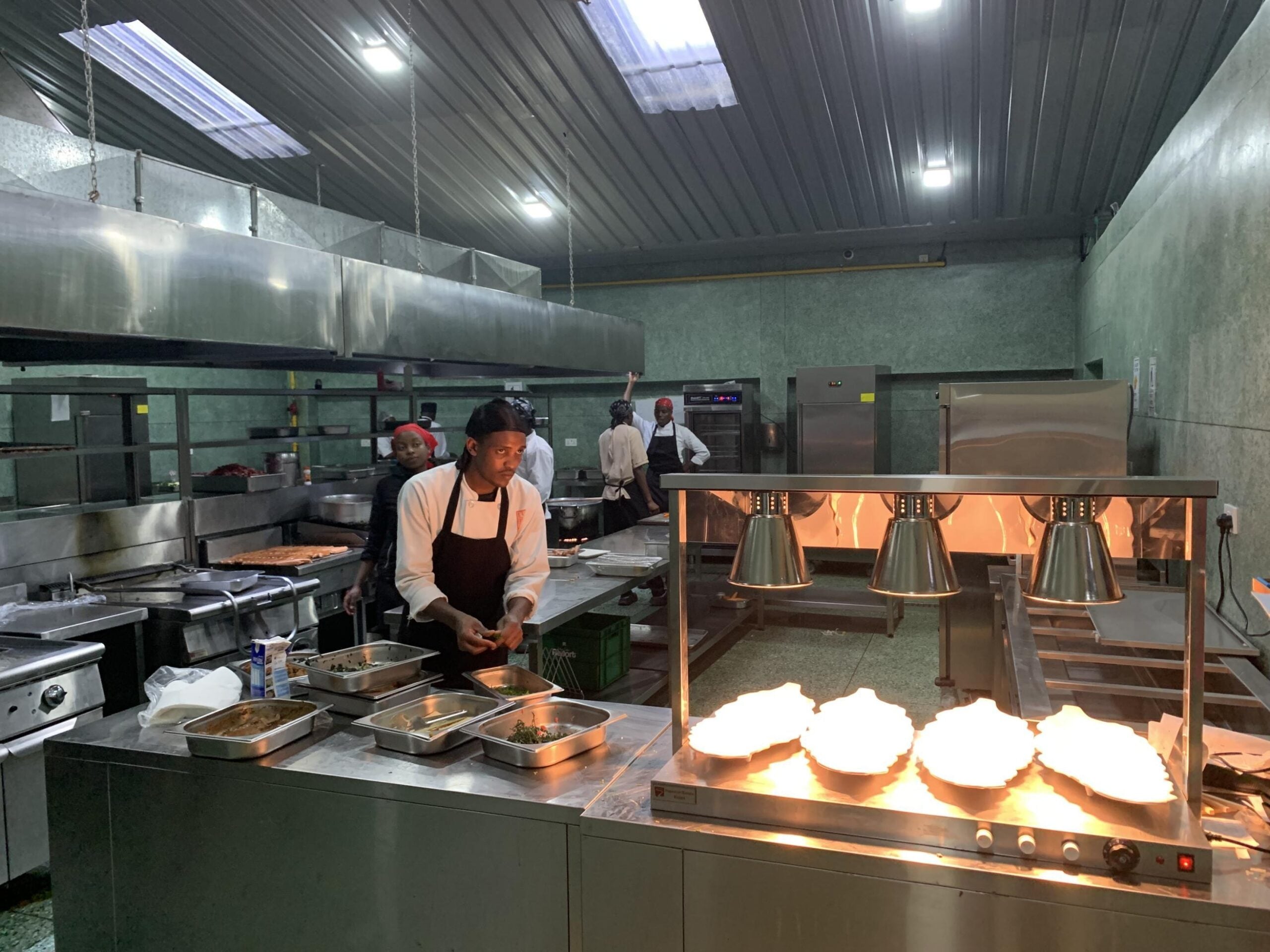 Cooking and serving area in operation at Ridge Cabin Resort in Limuru, Kenya